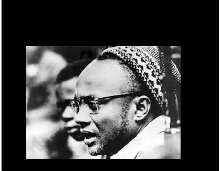 Black-and-white photograph of Amílcar Cabral in profile, wearing his signature patterned knit cap.